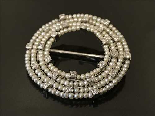 A 14ct white gold diamond and seed pearl brooch, width 34mm, weight 7.