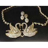 A vintage Attwood and Sawyer Swan necklaces with pendant and matching earrings.