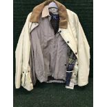 A Barbour cream rain jacket size Large, together with a Ralph Lauren Polo jacket size medium.