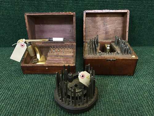 An antique horologist's tap and die set, in mahogany box together with another set similar,