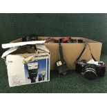 A box of cameras, flashes and lenses - Practica, Symbolica etc.