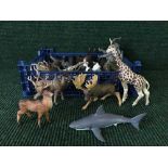 A basket of Papo plastic animals