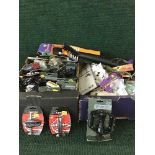 Three boxes of biking accessories including grips, bottle holders, mud guards, pedals etc.