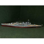 A large remote controlled scale model of a British battle ship