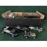 A box of large scale die cast vehicles, modern Dinky vehicles, vintage car in display case etc.