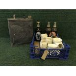 A vintage shell oil can together with a box of commemorative mugs, beakers, moustache cup,