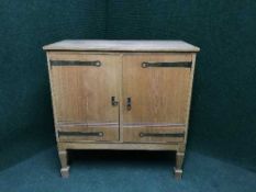 An oak double door cabinet