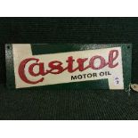 A cast metal Castrol motor oil wall plaque