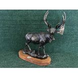 A cast metal figure - Stag on wooden base