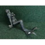 A cast metal figure - seated mermaid