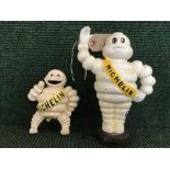 Two Michelin cast metal money banks