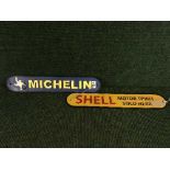 Two cast metal plaques - Shell motor spirit and Michelin tyres