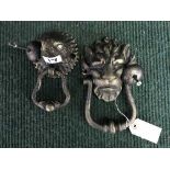 Two cast metal door knockers