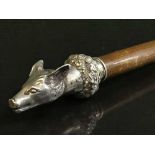 A cane mounted by solid silver cast of a fox's head inscribed Belford 26th September 1842