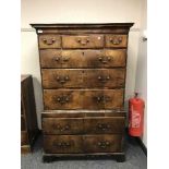 A George II walnut chest on chest,