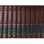 Three boxes of Encyclopedia Brittanica books