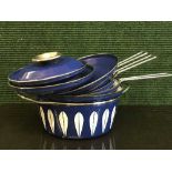 Four Catherine Holm of Norway blue lotus saucepans and lids