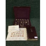 A cased silver proof stamp set: The Empire Collection, 25 gold-plated silver ingots,