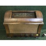 A Defiant walnut cased valve radio