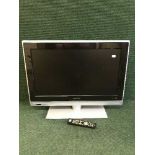 A Philips 26 inch LCD TV with remote