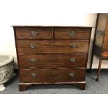 A Georgian mahogany five drawer chest on bracket feet