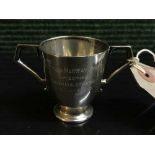 A small Brittania silver twin handled christening mug