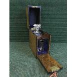 A Victorian burr walnut and ebonised decanter box with decanter and key by Samuel Fisher,