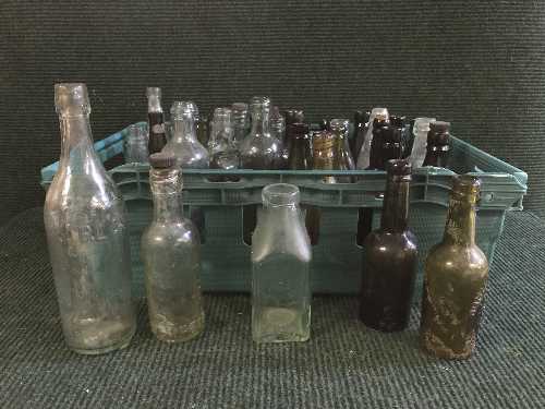 A large quantity of glass bottles