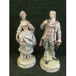 A pair of Dresden style porcelain figures