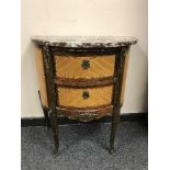 A continental inlaid walnut marble top chest