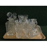 A tray of crystal and decanters