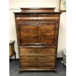 A continental mahogany secretaire chest