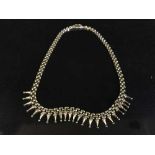 A 9ct gold Cleopatra style necklace