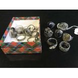 A collection of silver dress rings