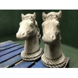 A garden figure - pair of horse heads