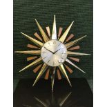 A 1970's Metamec sunburst clock