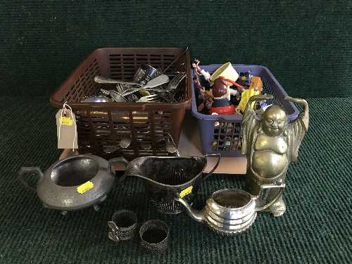 A tray of brass and silver plated items,