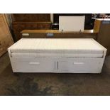 An Ikea Brimnes trundle bed