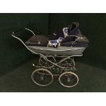 A mid 20th century Silver Cross pram