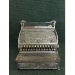 An early 20th century American National cash register and key