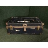 A metal bound travelling trunk