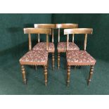 A set of four mahogany dining chairs