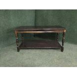 A stained oak coffee table