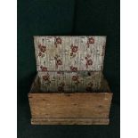 An antique stripped pine blanket box