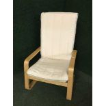 An Ikea beech framed armchair