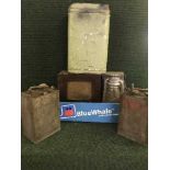 A box of vintage oil cans, tilly lamp,