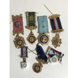 A collection of lodge medals,