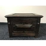 An Edwardian oak coal receiver with liner