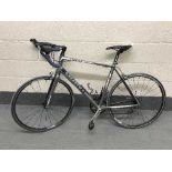 A Giant Defy road bike, blue and grey frame, size 54cm, branded groupset: FSA/Giant/Shimano,