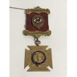 A 9ct gold and enamel Royal Order of Buffaloes medal, 11.